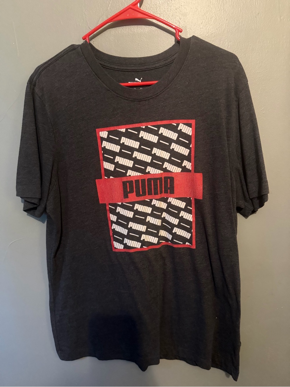 Puma Black Short-Sleeve Graphic Tee with Red Logo Panel